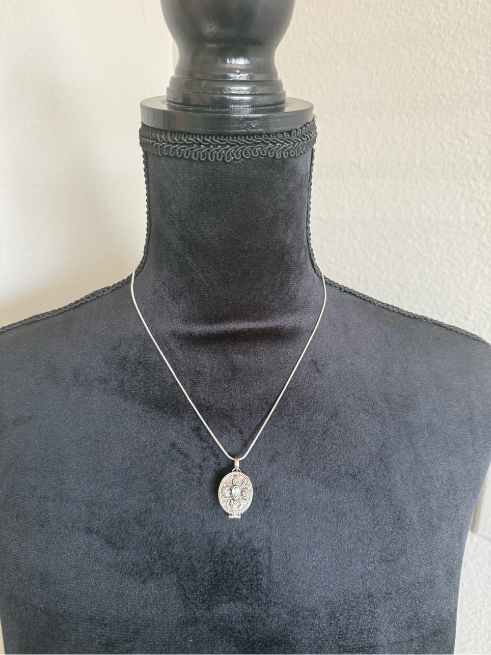 Sterling Silver Blue Topaz Oval Locket